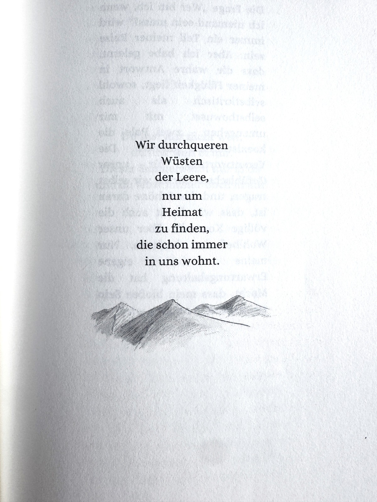 Buchseite mit Gedicht über Wüsten und Heimat