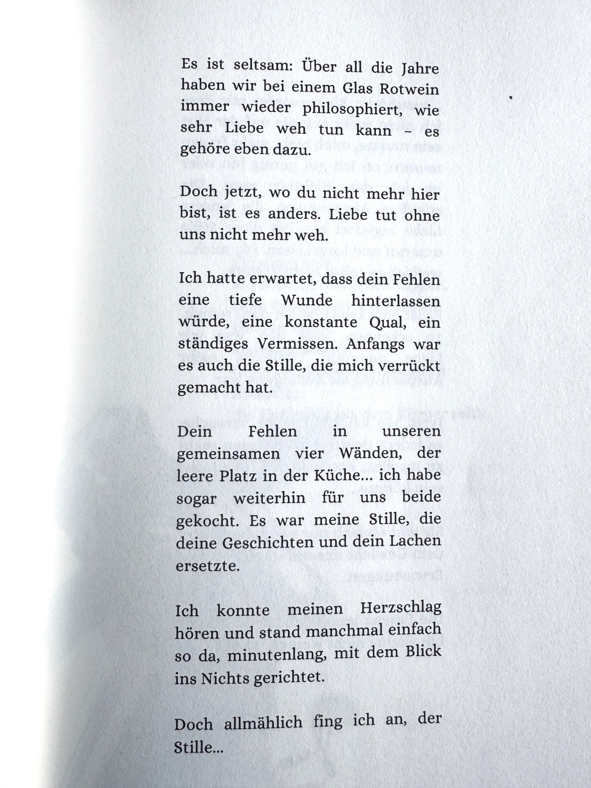 Buchseite mit einem Gedicht über Liebe und Verlust